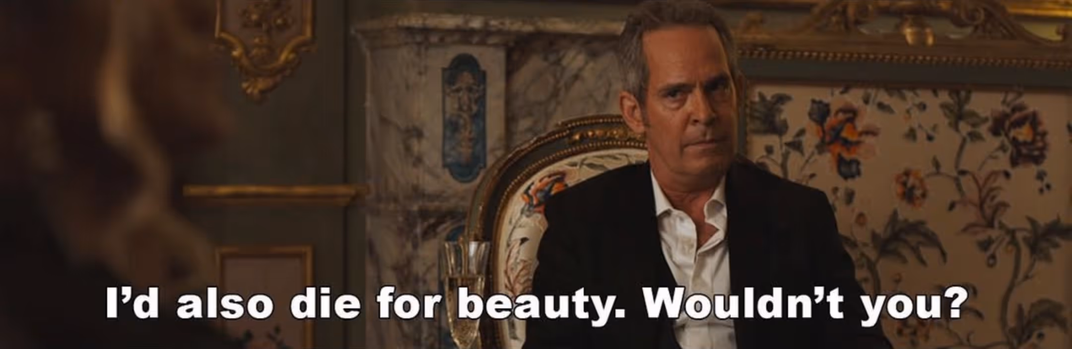 Scene from The White Lotus. Quentin says “I’d also die for beauty. Wouldn’t you?”